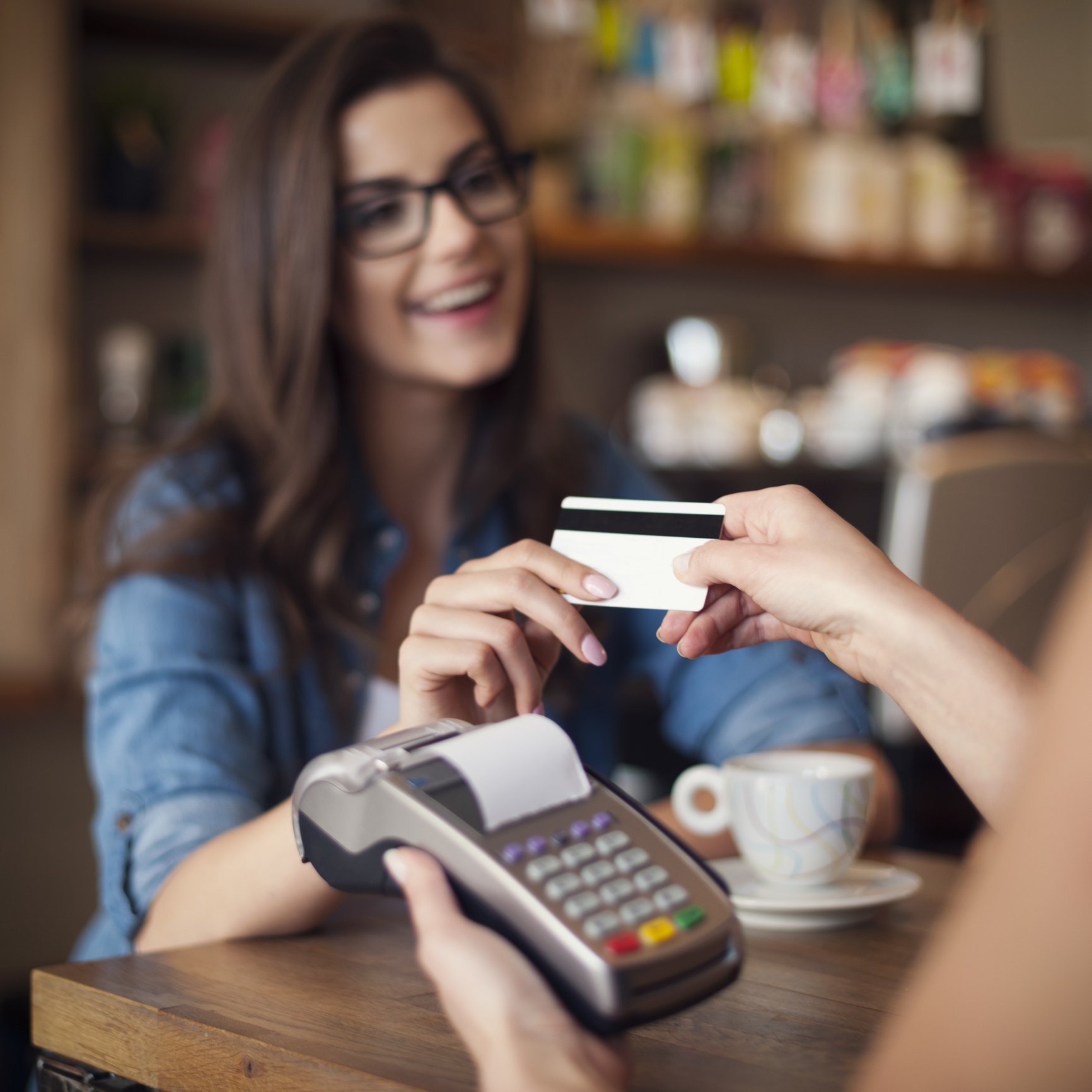Business owner reviewing payment statements